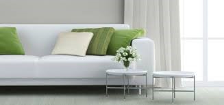 sofa with green pillows