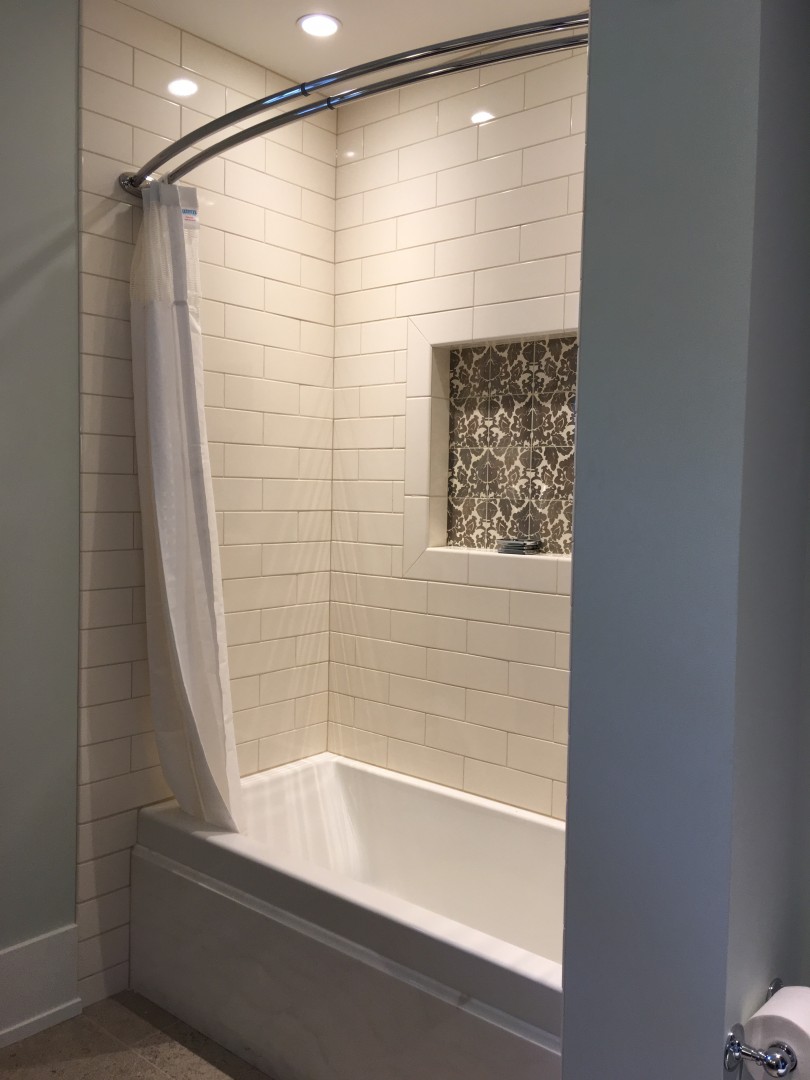 Luxury Guest Bath with Beautiful Tile Surround